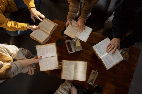 top-view-people-reading-togeth